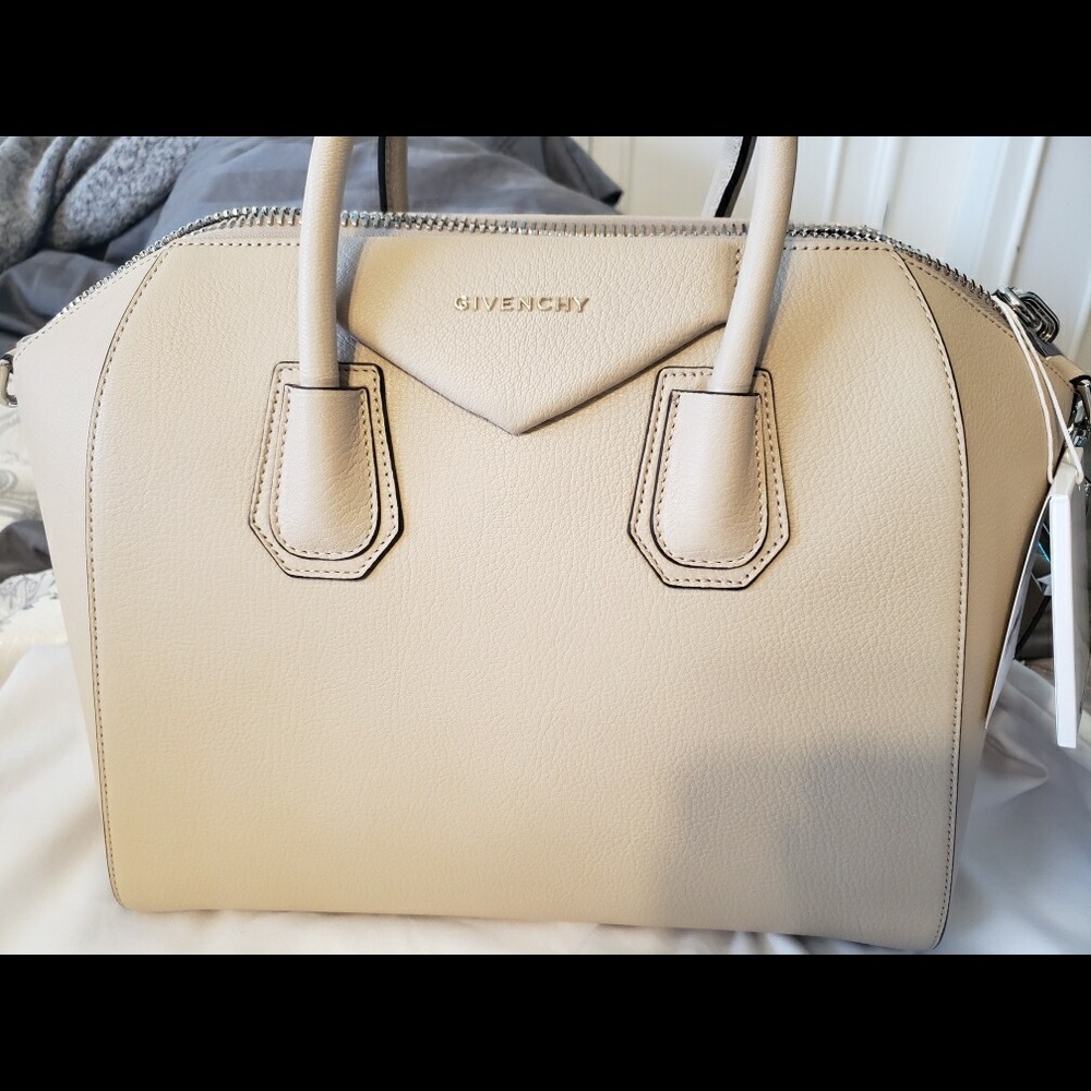 Brand New , Givenchy Bag,  Never worn , was a gift for my mom. Negotiable